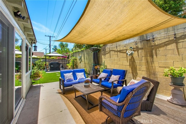 9099 Via Vista Dr, Buena Park, CA 90620 - fenced backyard featuring an outdoor hangout area and a patio