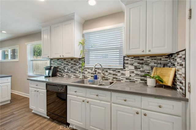 9099 Via Vista Dr, Buena Park, CA 90620 - kitchen featuring dishwasher, white cabinets, decorative backsplash, recessed lighting, and light wood-style flooring