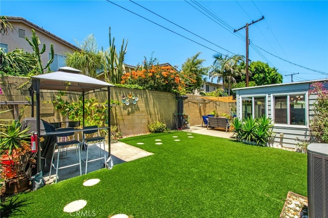 9099 Via Vista Dr, Buena Park, CA 90620 - fenced backyard featuring a gazebo, a patio area, and an outdoor hangout area