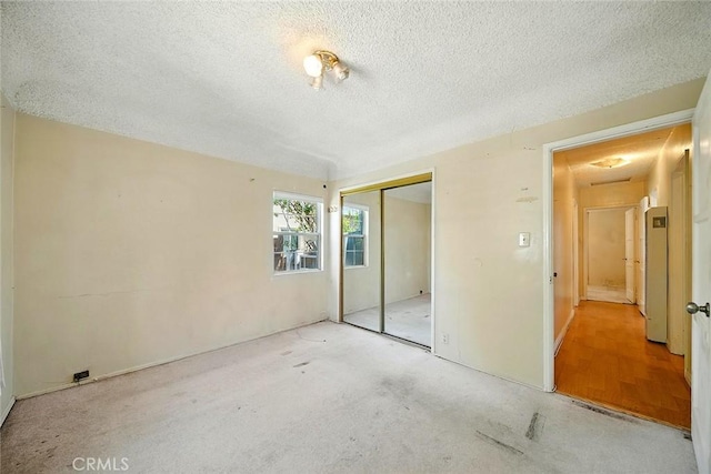17229 Ardath Ave, Torrance, CA 90504 - unfurnished bedroom with a closet and a textured ceiling