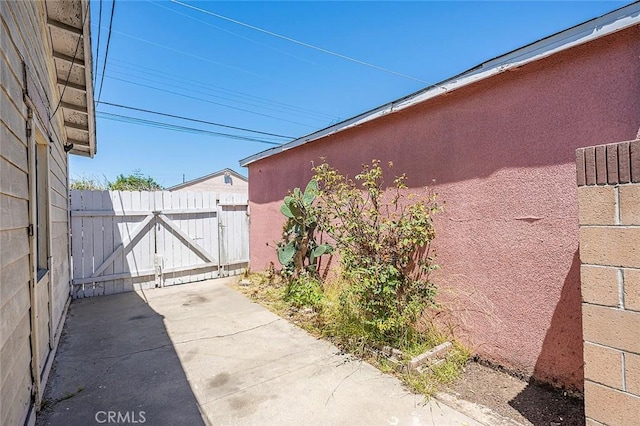 17229 Ardath Ave, Torrance, CA 90504 - view of side of home with a gate
