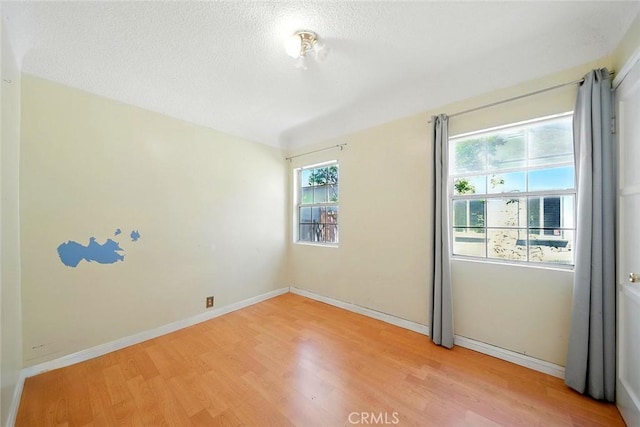17229 Ardath Ave, Torrance, CA 90504 - empty room featuring light wood-type flooring and a textured ceiling