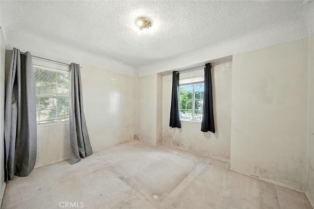 17229 Ardath Ave, Torrance, CA 90504 - empty room with a textured ceiling and plenty of natural light