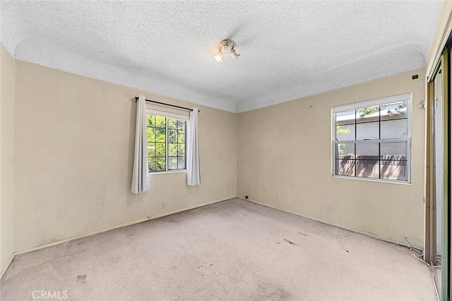 17229 Ardath Ave, Torrance, CA 90504 - empty room with a textured ceiling and carpet