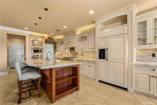 44277 Reidel St, Temecula, CA 92592 - kitchen with open shelves, backsplash, recessed lighting, paneled fridge, and light stone countertops