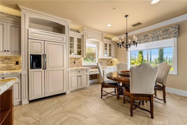 44277 Reidel St, Temecula, CA 92592 - dining area featuring a chandelier, recessed lighting, and crown molding