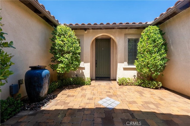 44277 Reidel St, Temecula, CA 92592 - property entrance featuring a patio area and stucco siding