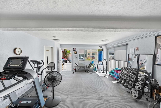 7135 Coldwater Canyon Ave Unit 16, North Hollywood, CA 91605 - workout area with a textured ceiling and a textured wall