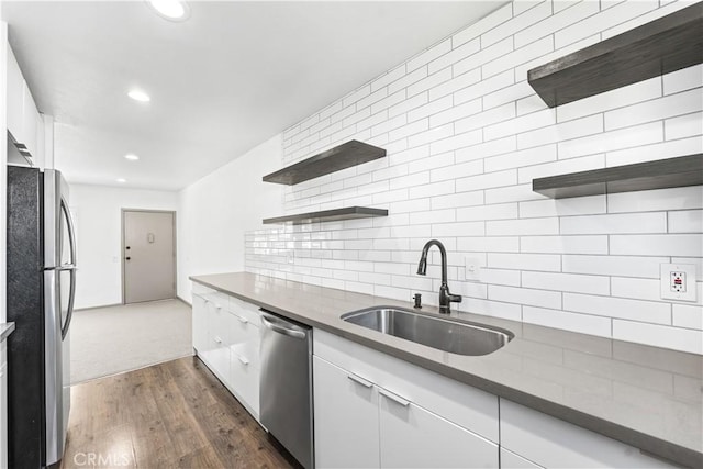 7135 Coldwater Canyon Ave Unit 16, North Hollywood, CA 91605 - kitchen with appliances with stainless steel finishes, open shelves, white cabinets, tasteful backsplash, and recessed lighting