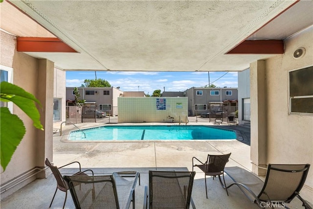 7135 Coldwater Canyon Ave Unit 16, North Hollywood, CA 91605 - view of pool with a patio area and a residential view