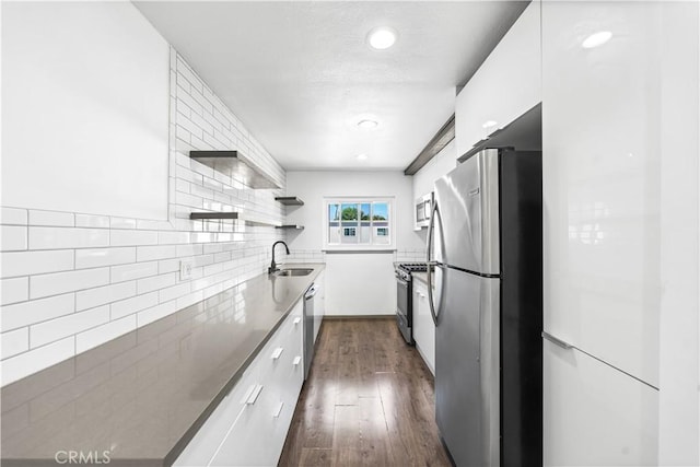 7135 Coldwater Canyon Ave Unit 16, North Hollywood, CA 91605 - kitchen with appliances with stainless steel finishes, modern cabinets, open shelves, dark wood-style floors, and recessed lighting