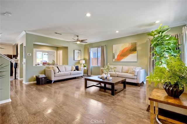 32839 Tiempo Cir, Temecula, CA 92592 - living area featuring ornamental molding, healthy amount of natural light, ceiling fan, recessed lighting, and wood finished floors