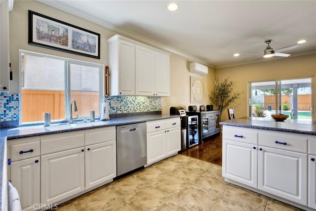 32839 Tiempo Cir, Temecula, CA 92592 - kitchen with dishwasher, an AC wall unit, tasteful backsplash, dark countertops, and recessed lighting