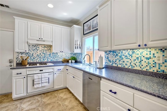 32839 Tiempo Cir, Temecula, CA 92592 - kitchen featuring oven, dishwasher, under cabinet range hood, dark countertops, and ornamental molding