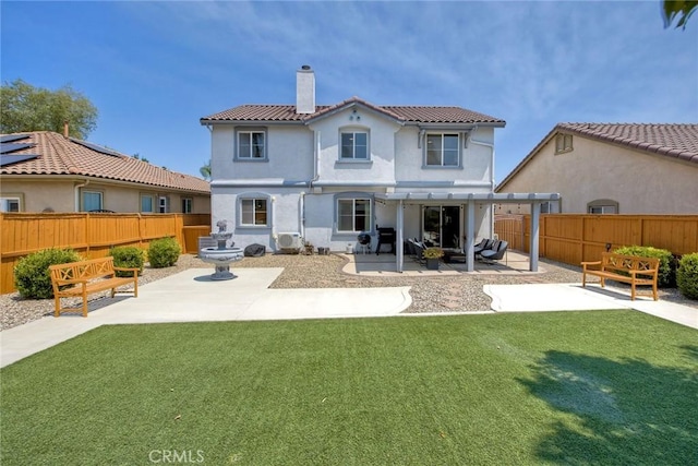 32839 Tiempo Cir, Temecula, CA 92592 - rear view of property with a chimney, a patio area, a pergola, and a fenced backyard