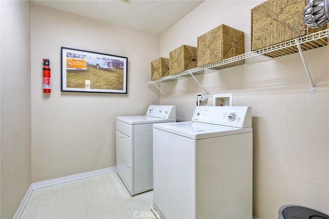 32839 Tiempo Cir, Temecula, CA 92592 - laundry room with washer and dryer and baseboards