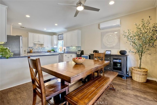 32839 Tiempo Cir, Temecula, CA 92592 - dining space featuring a wall mounted air conditioner, dark wood finished floors, ornamental molding, ceiling fan, and recessed lighting