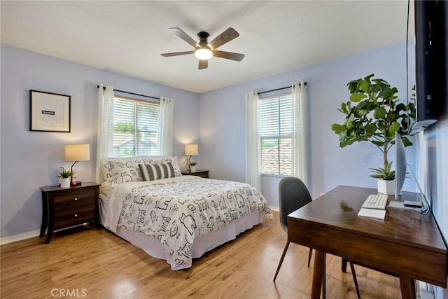32839 Tiempo Cir, Temecula, CA 92592 - bedroom with light wood-type flooring, a ceiling fan, and a desk
