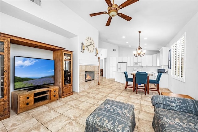 23681 Corte Sabio, Murrieta, CA 92562 - living area with vaulted ceiling, ceiling fan, a chandelier, a tile fireplace, and recessed lighting