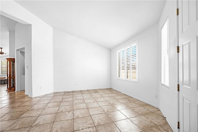 23681 Corte Sabio, Murrieta, CA 92562 - unfurnished room with vaulted ceiling and light tile patterned flooring