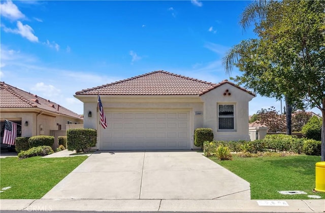 23681 Corte Sabio, Murrieta, CA 92562 - mediterranean / spanish house with a garage, stucco siding, a front lawn, and driveway
