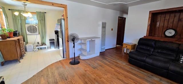 4141 Willow Trl, Frazier Park, CA 93225 - living area with a heating unit, wood finished floors, a chandelier, and cooling unit