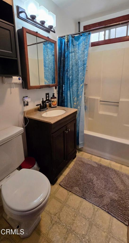 4141 Willow Trl, Frazier Park, CA 93225 - bathroom with vanity, shower / tub combo with curtain, and tile patterned floors