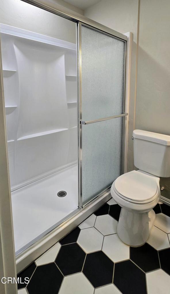 4141 Willow Trl, Frazier Park, CA 93225 - bathroom featuring a stall shower and tile patterned floors