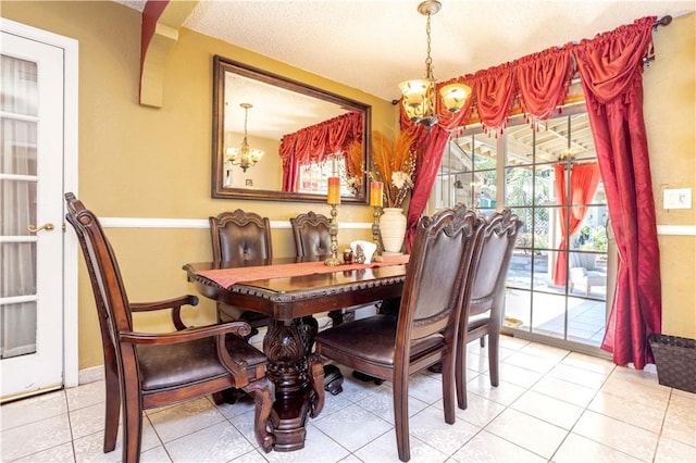 14724 Maclay St, San Fernando, CA 91345 - dining area with a chandelier and tile patterned floors