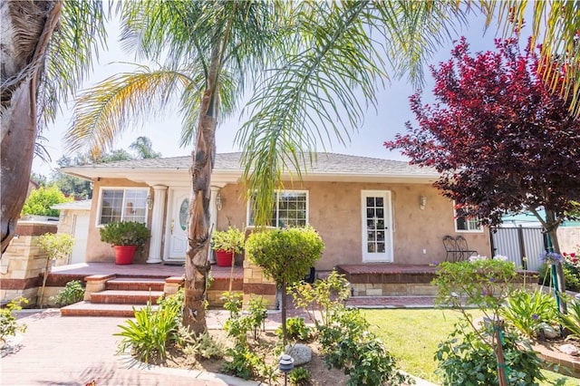 14724 Maclay St, San Fernando, CA 91345 - single story home with stucco siding and a porch