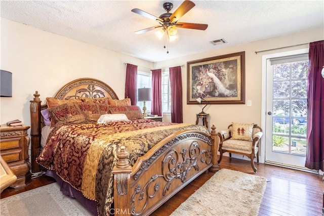 14724 Maclay St, San Fernando, CA 91345 - bedroom featuring access to outside, a textured ceiling, wood finished floors, and ceiling fan