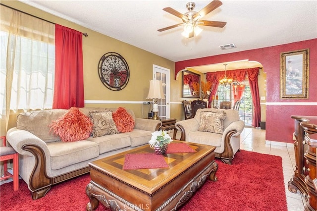 14724 Maclay St, San Fernando, CA 91345 - living area featuring a ceiling fan, light tile patterned floors, and a chandelier