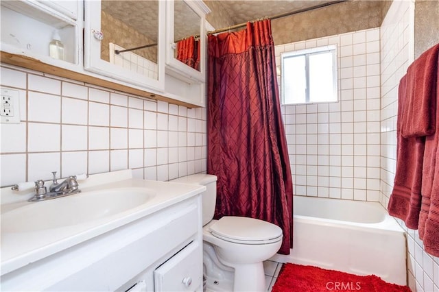 14724 Maclay St, San Fernando, CA 91345 - bathroom featuring tile walls, vanity, shower / tub combo with curtain, and tasteful backsplash