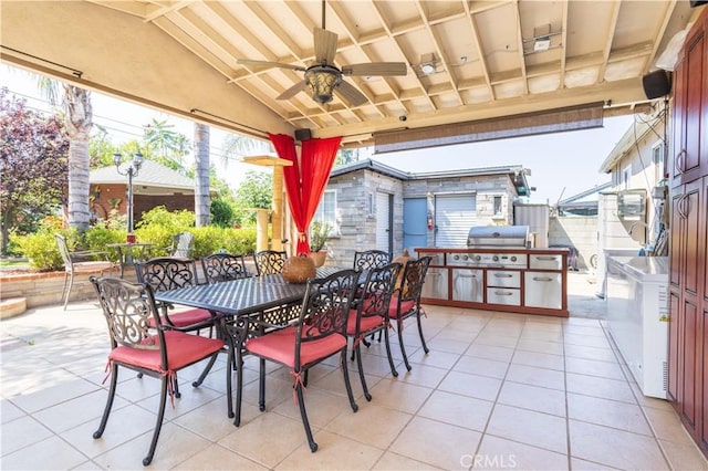 14724 Maclay St, San Fernando, CA 91345 - view of patio featuring outdoor dining space, ceiling fan, area for grilling, and an outbuilding