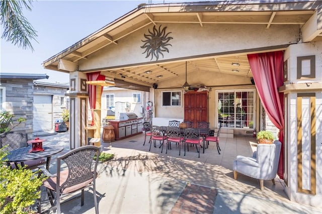 14724 Maclay St, San Fernando, CA 91345 - view of patio / terrace featuring outdoor dining area and ceiling fan