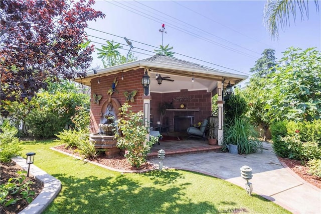 14724 Maclay St, San Fernando, CA 91345 - view of front facade featuring a front lawn, ceiling fan, brick siding, and a shingled roof
