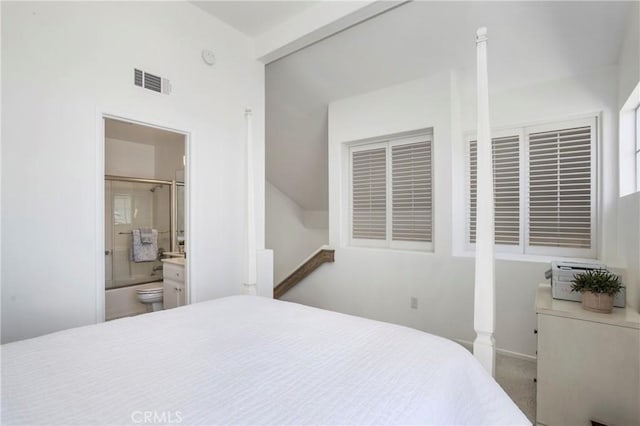 75 Shorebreaker Dr, Laguna Niguel, CA 92677 - bedroom with connected bathroom and vaulted ceiling