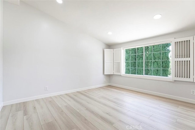 13119 Constable Ave, Granada Hills, CA 91344 - empty room featuring light wood-style flooring, lofted ceiling, and recessed lighting