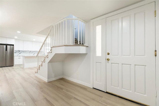 13119 Constable Ave, Granada Hills, CA 91344 - foyer entrance with stairway, light wood-style floors, and recessed lighting