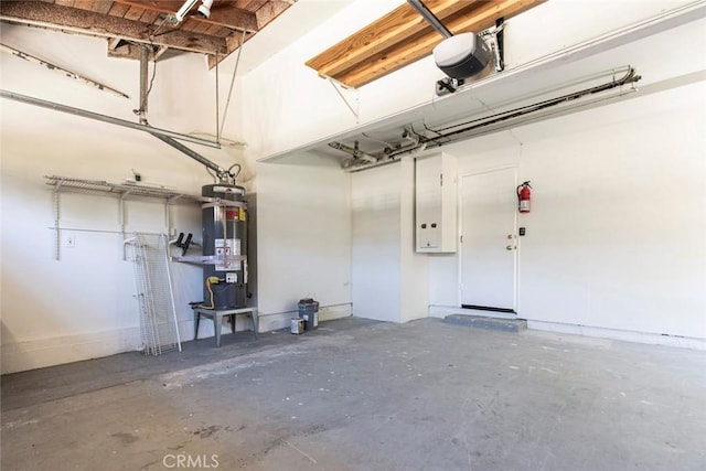 13119 Constable Ave, Granada Hills, CA 91344 - garage with a garage door opener and secured water heater