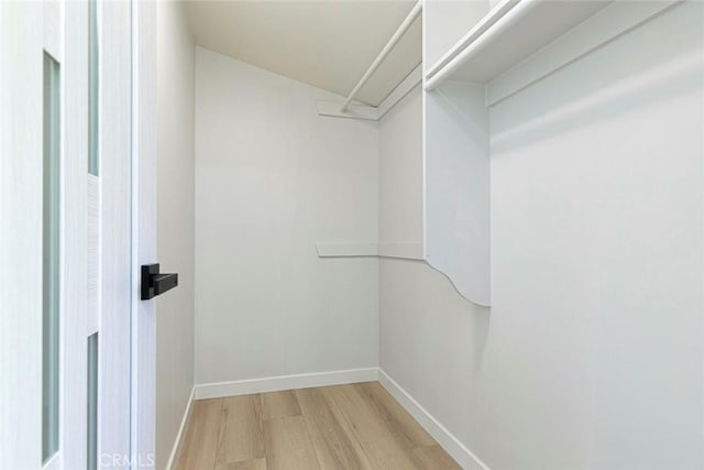 13119 Constable Ave, Granada Hills, CA 91344 - spacious closet featuring light wood finished floors
