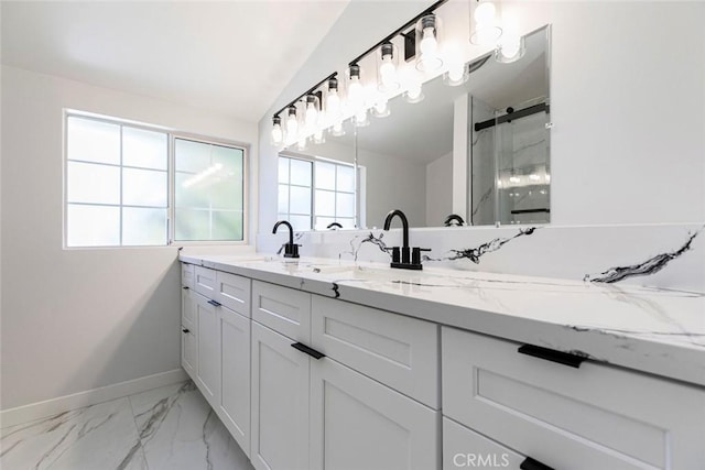 13119 Constable Ave, Granada Hills, CA 91344 - bathroom with double vanity, marble finish flooring, and a marble finish shower