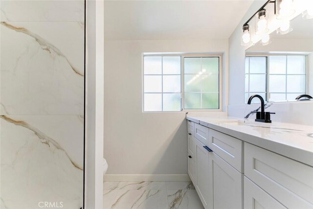 13119 Constable Ave, Granada Hills, CA 91344 - full bath featuring vanity and marble look tile flooring