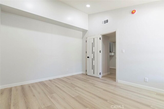 13119 Constable Ave, Granada Hills, CA 91344 - unfurnished room with light wood-type flooring, high vaulted ceiling, and recessed lighting