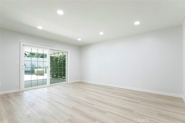 13119 Constable Ave, Granada Hills, CA 91344 - empty room with light wood-style floors and recessed lighting