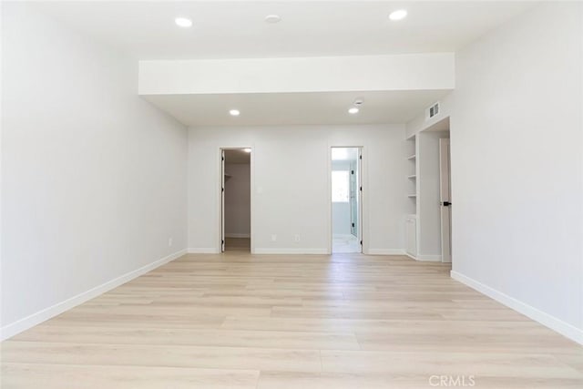 13119 Constable Ave, Granada Hills, CA 91344 - spare room with light wood-style flooring and recessed lighting