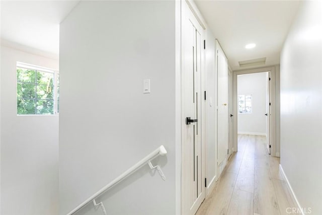 13119 Constable Ave, Granada Hills, CA 91344 - hall with light wood-type flooring and baseboards