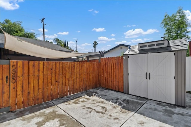 5080 Pearblossom, Riverside, CA 92507 - view of patio with a shed
