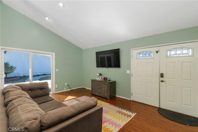 5080 Pearblossom, Riverside, CA 92507 - living area with wood finished floors, vaulted ceiling, and recessed lighting