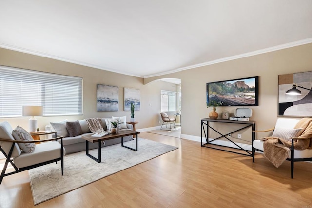 1361 Felspar St Unit 7, San Diego, CA 92109 - living area featuring arched walkways, ornamental molding, and wood finished floors